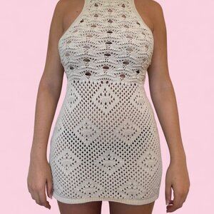 free people cream crochet mini dress, halter neckline with intricate patterns.